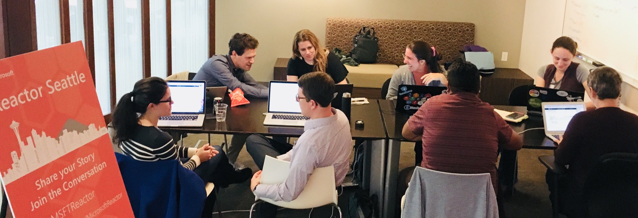 People discussing at a table